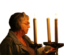 Babs reading by candlelight